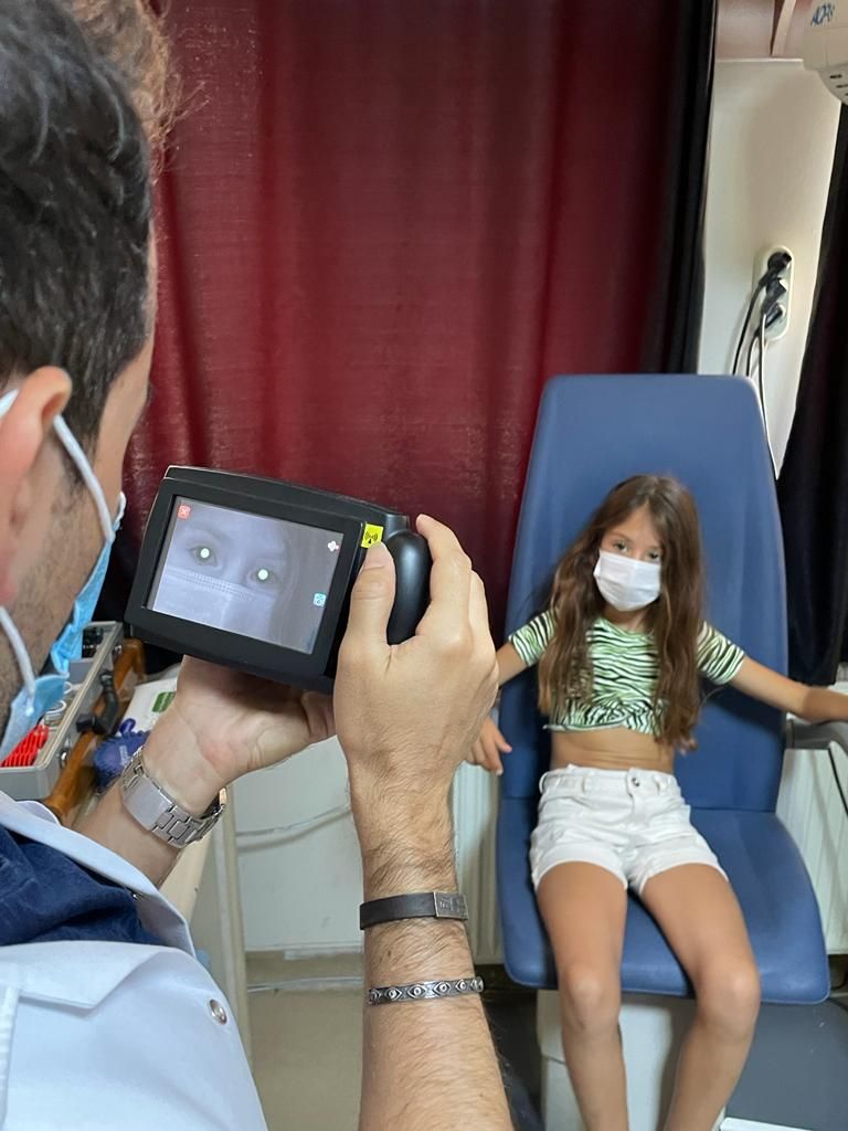 little girl getting eye check-up