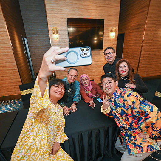Lion members taking a selfie
